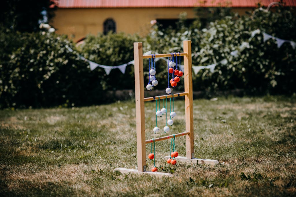 Colorful ladder ball game set up in a sunny backyard, perfect for outdoor fun.